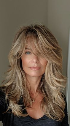 Revitalize your look with these 25 hairstyles for thin hair, specifically designed for women over 50. Explore styles that add volume and vibrancy, breathing new life into your locks. Long Hair Older Women, Layered Haircuts For Medium Hair, Hair Affair, Haircuts For Medium Hair, Hair Color And Cut, Long Layered Hair, Haircuts For Long Hair, Women Over 50, Party Hairstyles