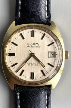 Mens Bulova Ambassador Automatic Watch 23 jewels self winding. Measures 35mm excluding the crown. In working order and very good condition. New straps fitted. Light signs of age. Free shipping to the lower 48 states. Classic Self-winding Watch For Anniversary, Classic Collectible Self-winding Watches, Classic Self-winding Watches For Anniversary, Classic Self-winding Collectible Watch, Vintage Self-winding Round Watch, Vintage Gold Watch With Date Display, Vintage Gold Watches With Date Display, Vintage Watch Accessories With Date Indicator For Formal Occasions, Vintage Self-winding Watch