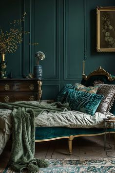 a bedroom with green walls and an antique bed