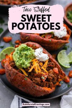 two stuffed sweet potatoes on a plate with guacamole and sour cream in the middle