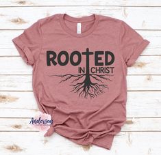 "This adult shirt has a Rooted In Christ design that is printed directly onto the shirt using a commercial Direct to Garment printer.  It is the perfect shirt year-round. Rooted In Christ ~ Rooted ~ Christian Shirt  SHIRT DETAILS: ~ Printed on either 100% Preshrunk cotton(solid colors) or 52/48 cotton/polyester blend(heather colors) ~ Short Sleeve Shirt ~ Shirts run true to size ~ Design is printed directly to the shirt using a commercial Direct to Garment printer that uses safe inks that are wa Rooted In Christ Shirt, Rooted In Christ, Christ Shirts, Lexington Nc, Retreat Ideas, Christian Shirt, Adulting Shirts, Center Pieces, Color Shorts