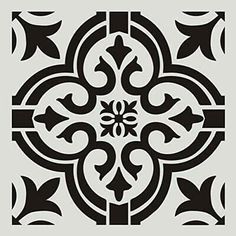 a black and white tile pattern with an ornate design