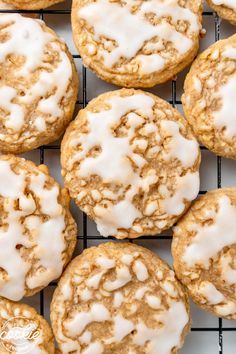 freshly baked cookies with white icing on a cooling rack