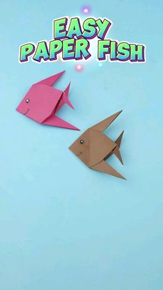 two paper fish on a blue background with the words easy paper fish