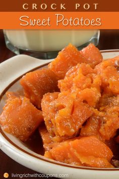 crock pot sweet potatoes in a white bowl next to a glass of yogurt