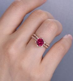 Ruby Ring Ruby Engagement Ring Dainty CZ Diamond Stacking Ring July Birthstone 14K Rose Gold Round Cut Ruby Ring Sterling Silver Rings Unique wedding set,perfect as engagement/wedding ring, birthday or anniversary gift, etc. Engagement Ring ❀gemstone is 7mm round cut lab ruby, about 1.6ct❀ ❀side stone and halo stone are CZ man made diamond stones,VVS Clarity,AAA❀ ❀925 Sterling Silver,Rose/White/Yellow Gold Plated❀ Wedding Band ❀Round cut CZ man made diamond stones,VVS Clarity,AAA❀ ❀925 Sterling Ruby Engagement Ring Gold, Ruby Ring Designs, Ruby Engagement Ring Set, Fire Opal Engagement Ring, Engagement Ring Gemstone, Ruby Wedding Band, Star Ruby Ring, Opal Engagement Ring Set, Ruby Ring Vintage