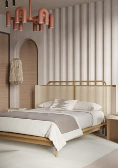 a large bed sitting next to a wooden headboard