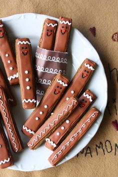 a white plate topped with chocolate covered pretzels