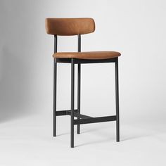 an image of a bar stool with leather seat and backrests on white background