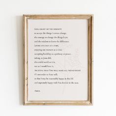 a framed poem is hanging on the wall