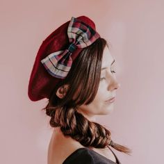 A machine made oxblood red wool felt French beret hat customised with a large handmade wine red and tan tartan bow.This burgundy winter hat is approximately 25cm (10 inches) in diameter and is a ladies one size.These berets will comfortably fit a an average head size of approximately 21-22 inches. However, they do stretch with regular wearing.It is also possible to make the berets bigger by unfolding the inner lip of the beret. This does increase the size significantly.The bow is approximately 1 Red Berets, Pink Beret, French Beret Hat, Red Beret, Black Beret, Types Of Hats, Oxblood Red