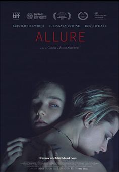 the movie poster for allure with two women hugging each other in front of a dark background