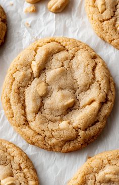 peanut butter cookies are arranged on wax paper