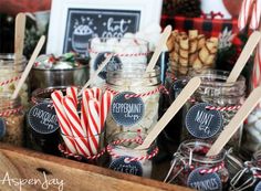 mason jars filled with candies and candy canes