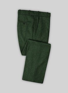 Flaunt your elegant dressing sense with great zeal by simply donning our Harris Tweed Wide Herringbone Royal Green Pants. Crafted from 100% wool, the pants add a touch of class to your wardrobe and you will definitely be the recipient of compliments all day long, thanks to the rich fresh hue and the herringbone weave on the outfit.    Look Includes  Harris Tweed Wide Herringbone Royal Green Fabric  Cross Pocket  Flat Front  Two Welted Back Pockets on Trousers   You can change the look during cus Elegant Fitted Tweed Bottoms, Classic Wool Dress Pants For Winter, Elegant Wool Bottoms For Winter, Tailored Tweed Pants For Fall, Elegant Tweed Pants For Business, Elegant Tweed Bottoms For Business, Winter Wool Dress Pants For Formal Occasions, Wool Dress Pants For Winter Formal, Elegant Tweed Pants For Tailoring