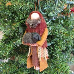 an ornament hanging from a christmas tree