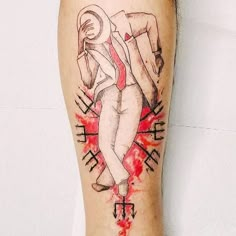 a person with a tattoo on their leg