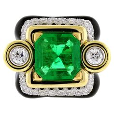 From David Webb, a beautiful emerald ring with diamonds and black enamel. The ring does have a U guard in it. • Designer: David Webb • Metal: 18 karat gold • Circa: 1980s • Size: 5, cannot be resized • Gemstones: Emerald and Diamonds • Weight: Emerald=5.15cts 26Diamonds=1.25cts • Emerald origin : Colombia Minor • Packaging: Pampillonia presentation box • Condition: Good Emerald Ring With Diamonds, Emerald And Diamond Ring, David Webb, Emerald Diamond Ring, Emerald Diamond, Emerald Ring, Black Enamel, Fashion Rings, Diamond Ring