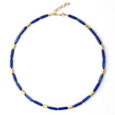 Immerse yourself in the sophisticated simplicity of this Lapis Lazuli necklace, inspired by Salvador Dali's "Madrid." Its modern edge, yet effortless, whispers timeless beauty and distinction. Feel remarkable, draped in an aura of elegance that complements your every move. • 17" Total Length, + 1.5" Adjustable Extension • Lapis Lazuli Beads 4mm x 13mm, Semi-precious stone, From Afghanistan • 22K Gold Plated Sterling Silver Adjustable Clasp, From Vietnam • 22K Gold Plated Sterling Silver Extensio Beaded Sapphire Necklace In Lapis Lazuli, Blue Lapis Lazuli Beaded Necklaces, Elegant Lapis Lazuli Beaded Necklace, Luxury Lapis Lazuli Beaded Necklaces, Luxury Faceted Lapis Lazuli Necklace, Lapis Lazuli Blue, Lapis Necklace, Princess Necklace, Lapis Lazuli Necklace