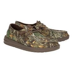 HEYDUDE | Women's Casual | Wendy Realtree Edge® Colors - Brown/camo | Size 7 - Introducing the ultimate blend of rugged and refined. These kicks are ready to tackle the great outdoors, but won't shy away from a night on the town. Easy-on system, flexible outsole and the classic Realtree edge pattern. Get ready to be effortlessly cool, and comfortable whether you're stalking your prey or stalking that new coffee shop. Shoe Specs: Flex & Fold Technology Ultralight outsole Canvas Realtree Edge® pat Cute Hey Dudes, School Uniform Shoes, Shop Shoe, School Uniform Kids, Country Jokes, Women's Casual Shoes, Hey Dudes, Online Closet, Wide Shoes