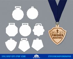 some medals and tags for the finisher's marathon are shown in front of a gray background