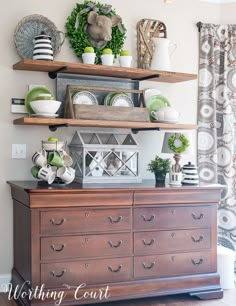 a shelf with plates and other items on it in front of a window that says spring farmhouse break at the worthing court blog