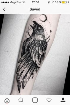 a black and white tattoo with a bird on it's arm, next to the moon