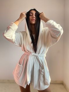 "Warm winter robe. A soft fluffy house robe is a great gift for her for the New Year. Mothers Day Warm dressing gown on a belt with a hood and pockets. Very comfortable warm and soft bathrobe. Home clothing is a unique type of product designed to give a feeling of comfort, coziness and warmth. The warm texture of the fabric will provide home comfort on autumn and winter evenings. Experience the highest quality of our products. Functions * Knitwear is very delicate, soft, warm, fluffy, durable. * Winter White Sleepwear For Relaxation, White Winter Sleepwear For Relaxation, Cream Winter Sleepwear For Loungewear, Cozy Robe With Relaxed Fit For Loungewear, Cream Winter Sleepwear For Lounging, Cozy Relaxed Fit Robe For Loungewear, Cozy Hooded Robe For Loungewear, Soft Comfortable Sleepwear For Home, Soft And Comfortable Sleepwear