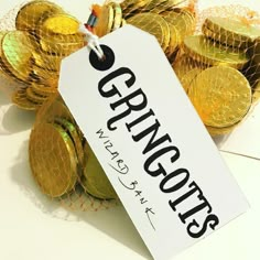 there is a sign that says craggy on it next to some gold coins