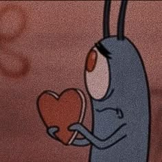 a cartoon character holding a heart in his hand