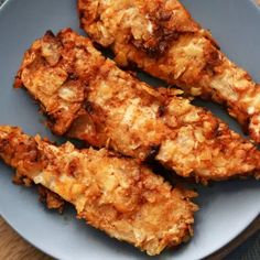 some fried food is on a blue plate