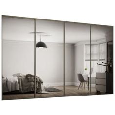 an image of a bedroom with mirrored doors