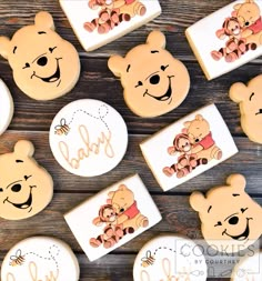 some cookies with winnie the pooh designs on them