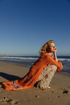 Orange Handmade Knit Cardigan-Dress is spun from a soft silk-blend cotton and silk. This long light handmade knit cardigan-dress definitely makes you unique during summer time. The cardigan looks perfect from casual style to evening dresses. Product Details Composition: cotton & silk  Belt Dry cleaning only Model is wearing size S Summer Cardigan Outfit, Shirt Editorial, Long Summer Cardigan, Cardigan Outfit Summer, White Crochet Crop Top, Crochet Beachwear, Orange Crochet, Crochet Midi Dress, Crochet Midi