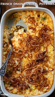 a casserole dish with onions and cheese