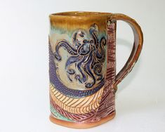 a ceramic mug with an octopus on it