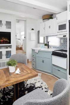 the kitchen is clean and ready to be used as a dining room or living room