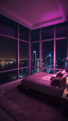 a large bed sitting in a bedroom next to a window filled with purple light at night