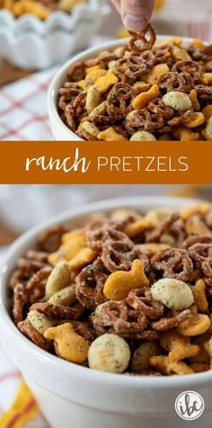 a person is scooping some food out of a bowl with the words ranch pretzels on it