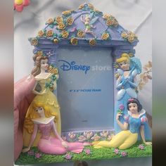 there is a photo frame made to look like disney princesses