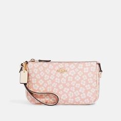 Pink Coach Bag With Zipper Closure, Pink Rectangular Shopping Pouch, Pink Clutch Wristlet, Pink Wristlet With Removable Pouch As Gift, Pink Daily Use Pouch, Pink Coach Bag As Gift, Pink Rectangular Feminine Wallet, Handheld Zipper Pouch, Handheld Pouch With Detachable Strap