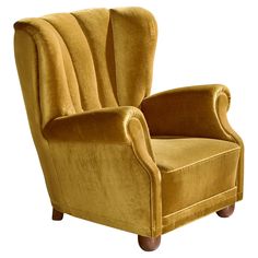 an upholstered yellow chair with wooden legs and arm rests against a white background