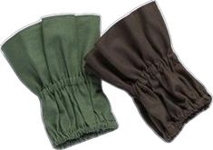 two green and brown oven mitts sitting next to each other on a white background