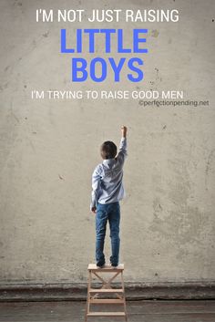 a little boy standing on top of a wooden chair with the words i'm not just raising little boys, i'm trying to raise good men