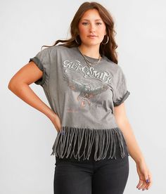 Goodie Two Sleeves Aerosmith Band Fringe T-Shirt - Grey X-Small, Women's Black Distressed graphic washed t-shirt Raw edge details Bust measures 42 on size small Body length 19 on size small. 100% Cotton. Machine wash cold with like colors. Only non-chlorine bleach. Low iron if needed. Do not iron decoration.. Measurements: Bust -Fullest part of bust with arms at sides. Waist -Circumference of natural waist: above belly button below rib cage. Hips -Standing with feet together fullest part of hips Fringe Tshirt, Tshirt Bag, Iron Decoration, Aerosmith, Waist Circumference, Women's T Shirts, T Shirt For Women, Rib Cage, Low Iron