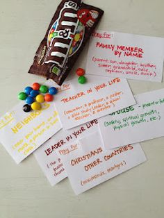 candy bar and business cards with the names of different types of candies on them