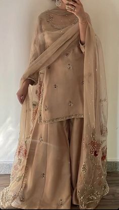 Pakistani Clothing Brands, Pakistani Gharara Designs Party Wear, Long Shirt With Plazo Wedding Dress, Beige Indian Outfit, Pakistani Guest Wedding Outfits, Fancy Pakistani Dresses, Sanchak Dresses, Dholki Outfit, Pakistani Suit Design