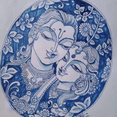 a blue and white drawing of two women with their faces painted on the side of a plate