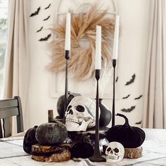 a dining room table with halloween decorations on it