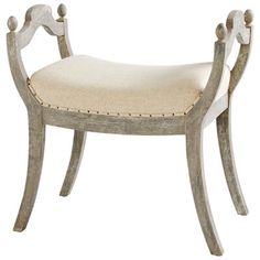 a wooden chair with a white upholstered seat and curved back, on a white background